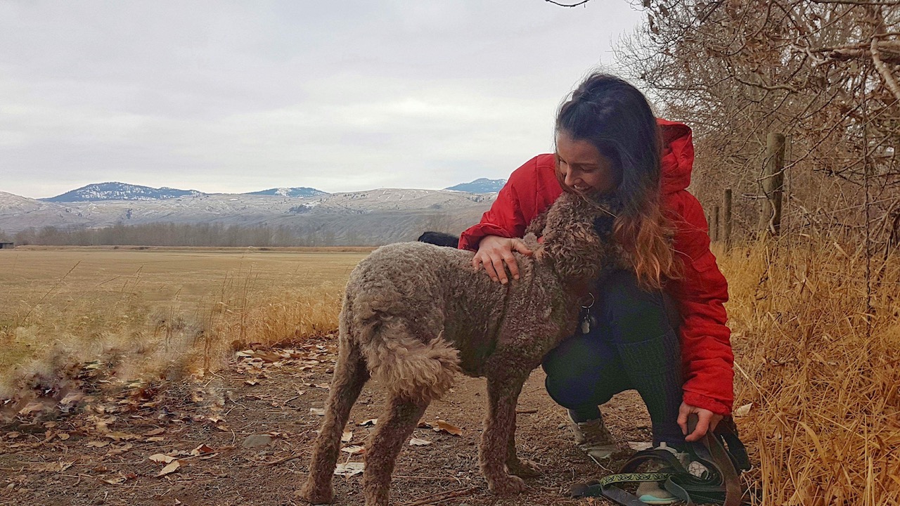 Outdoor image of Lori with dogs